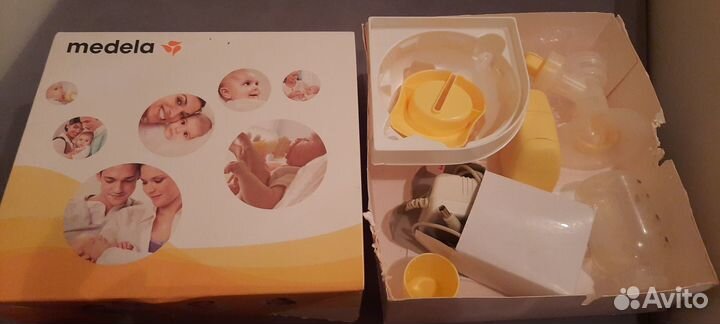 Молокоотсос medela электрический