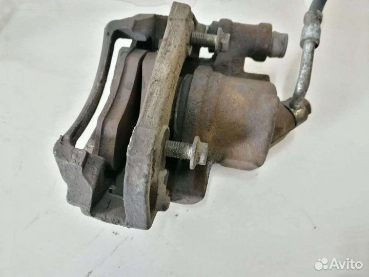 Суппорт передний Ford Escort 1995-2001