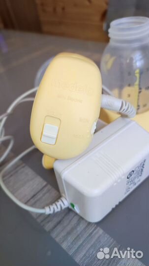 Молокоотсос medela электрический