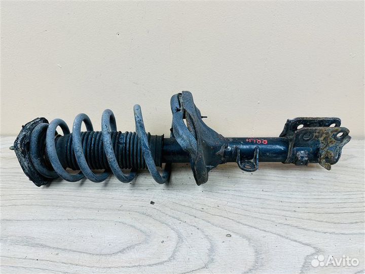 Амортизатор задний левый Hyundai Tucson 1 2.0 ат