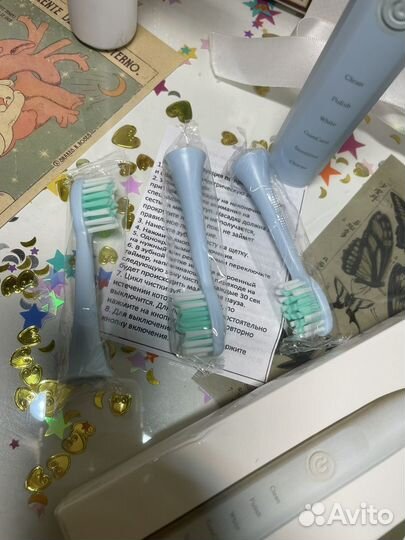 Электрическая зубная щетка