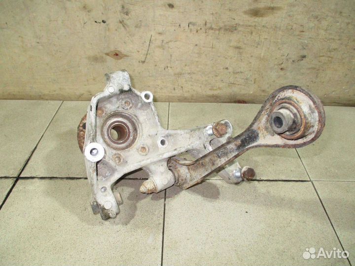 Кулак поворотный задний левый VW Tiguan 1