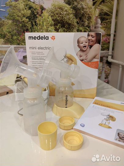 Молокоотсос medela mini electric