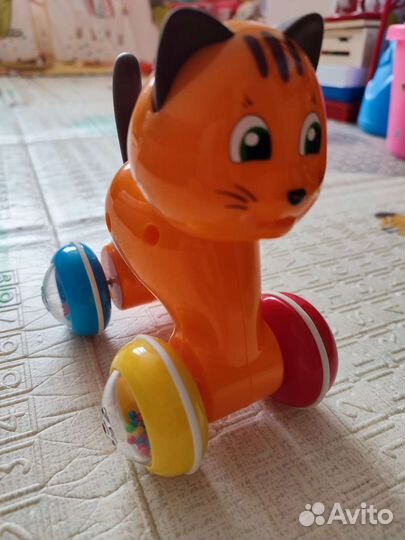 Игрушка каталка
