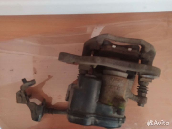 Суппорт задний левый Ниссан икс Трейл Т-32