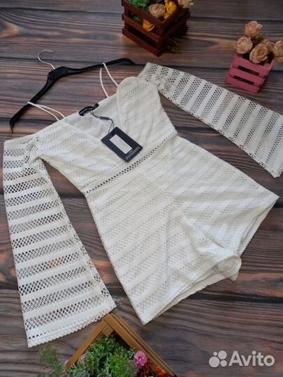 Комбинезон новый 42 размер