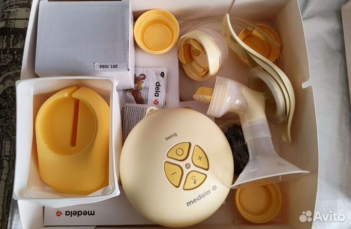 Молокоотсос medela электрический