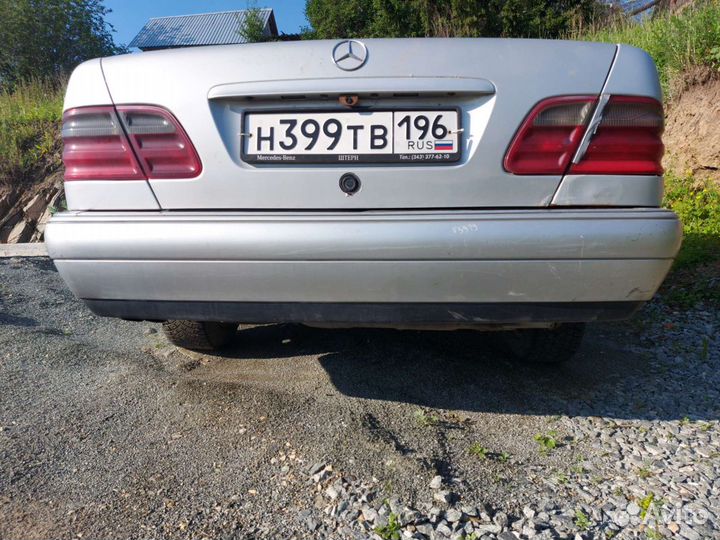 Задний бампер w210