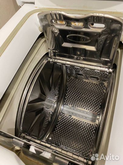 Стиральная машинка с вертикальной загрузкой