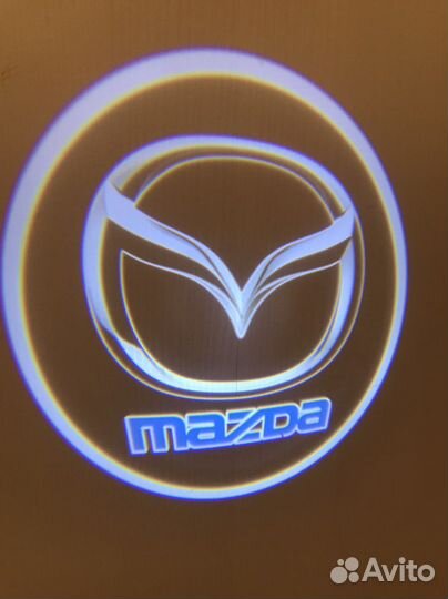 Линзы подсветка в двери для а/м Mazda