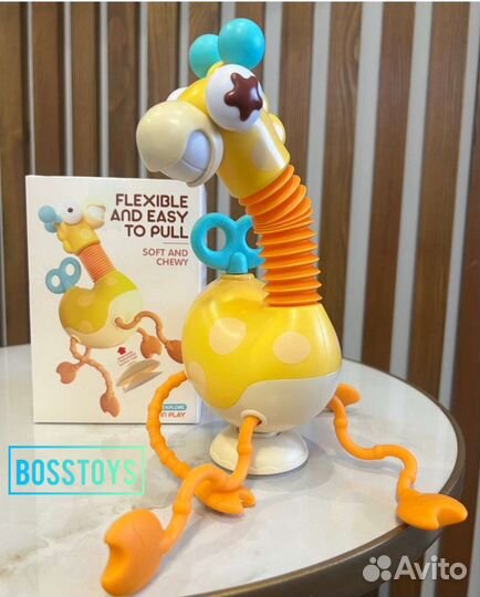 Развивающая игрушка жираф- тянучка новая в упаковк