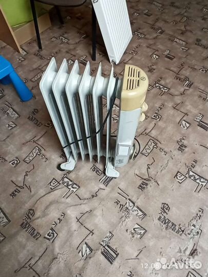 Масляный обогреватель