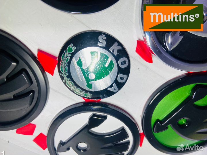 Эмблема skoda octavia