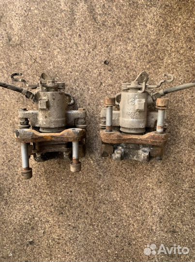 Суппорт тормозной задний Volkswagen Skoda