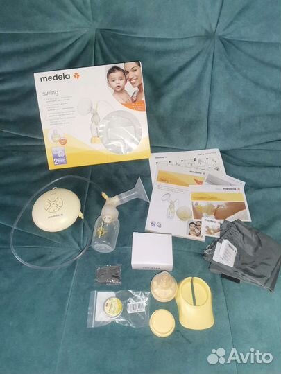 Молокоотсос medela электрический