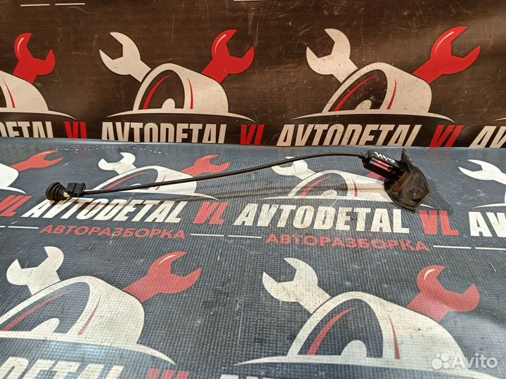 Трос лючка бензобака Opel Astra H