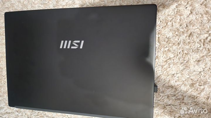 Игровой ноутбук MSi modern 15 b12m