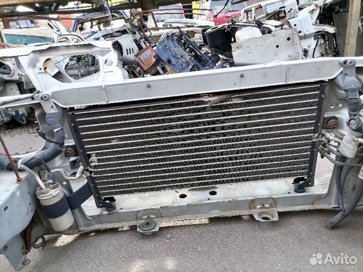 Радиатор кондиционера Nissan Avenir W10