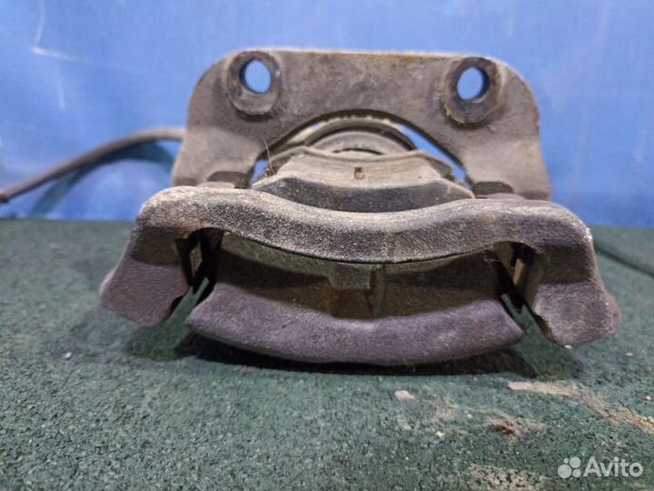 Суппорт тормозной передний левый Renault Logan 1