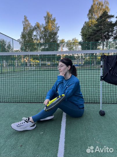 Тренер по большому теннису