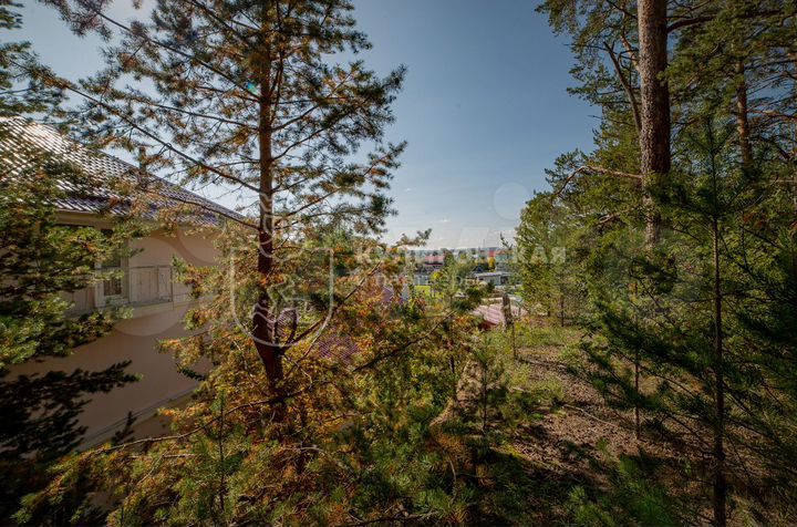 Коттедж 421,4 м² на участке 11,5 сот.