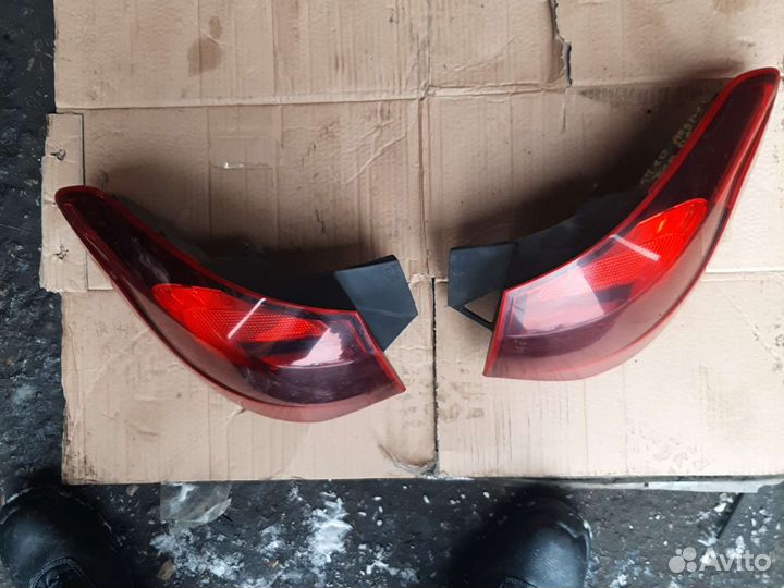 Фонарь Опель Астра J джей универсал