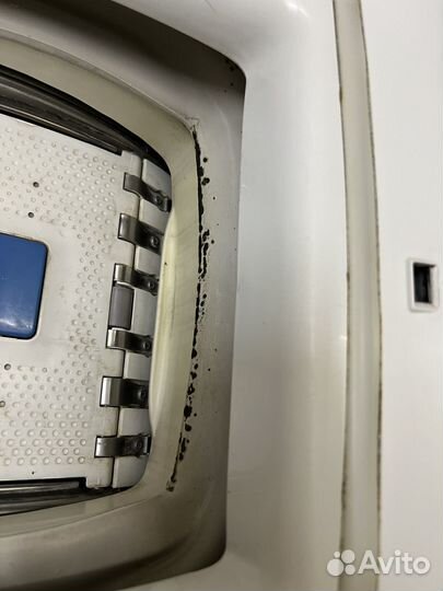 Стиральная машина с вертикальной загрузкой Candy