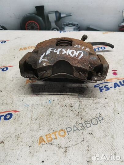 Суппорт тормозной передний левый Ford Fiesta MK5