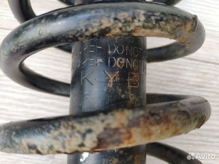 Стойка амортизатора задняя Mitsubishi Lancer IX 9