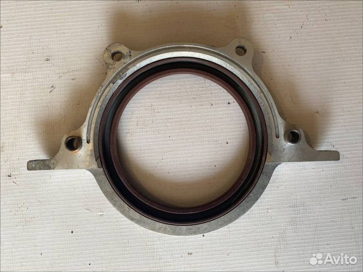 Крышка коленвала задняя Mazda 323