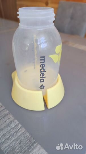 Молокоотсос medela электрический