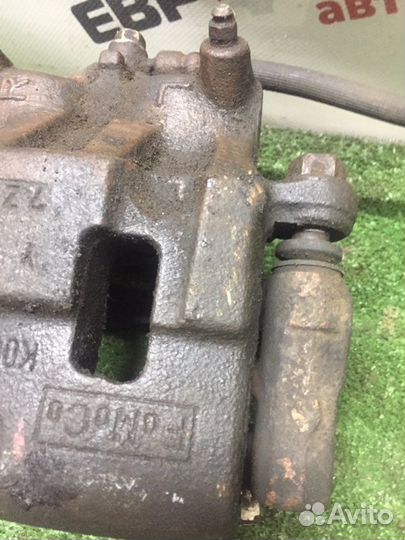 Суппорт тормозной передний левый Mazda Cx-7