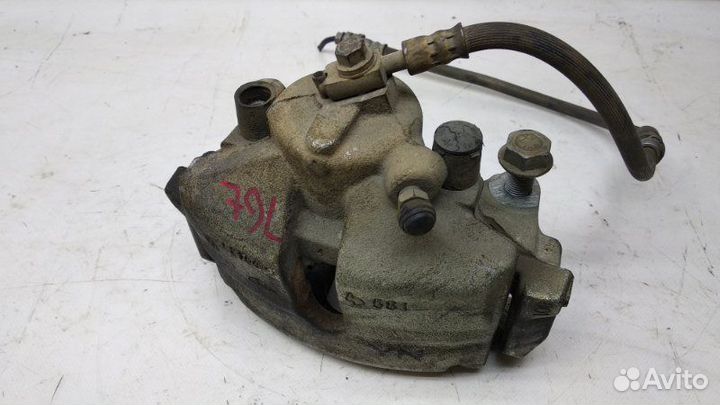 Суппорт передний левый Volkswagen Jetta 6 2.0 TDI