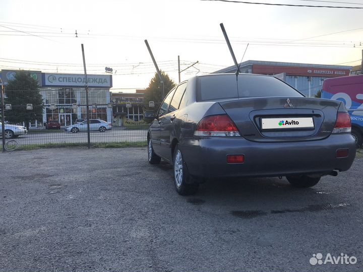Mitsubishi Lancer 1.6 МТ, 2006, 311 923 км