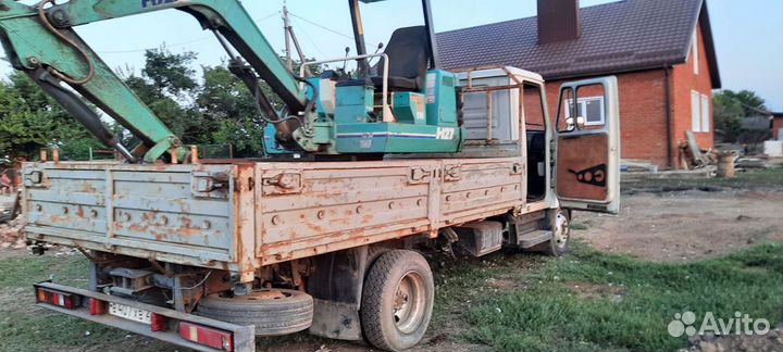 Услуги миниэкскаватора