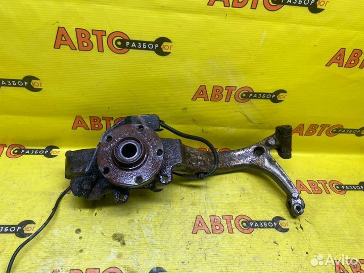 Поворотный кулак передний левый Volkswagen Passat