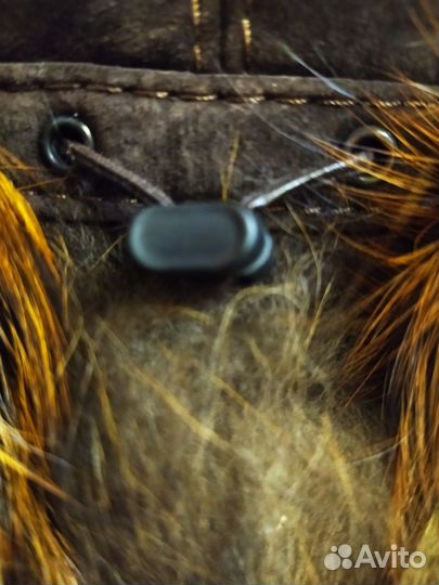 Женские меховые шапки