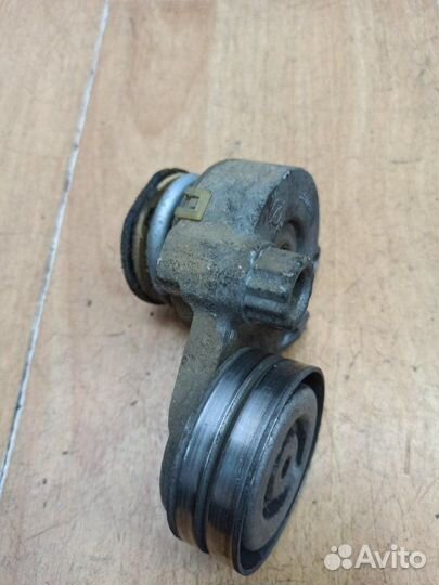 Натяжной ролик приводного ремня Opel Astra H