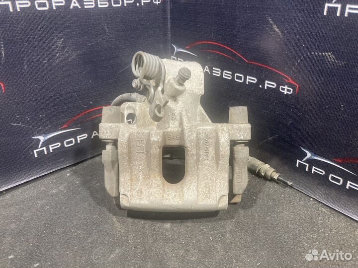 Суппорт тормозной задний левый mazda 3 bk