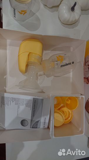Молокоотсос medela электрический и бутылка Calma