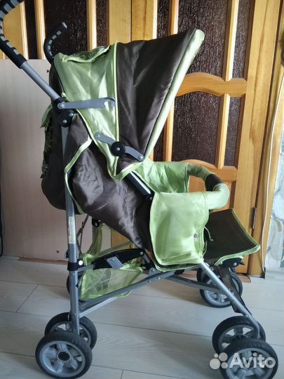 Прогулочная коляска. Трость. Складная