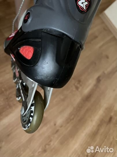 Роликовые коньки