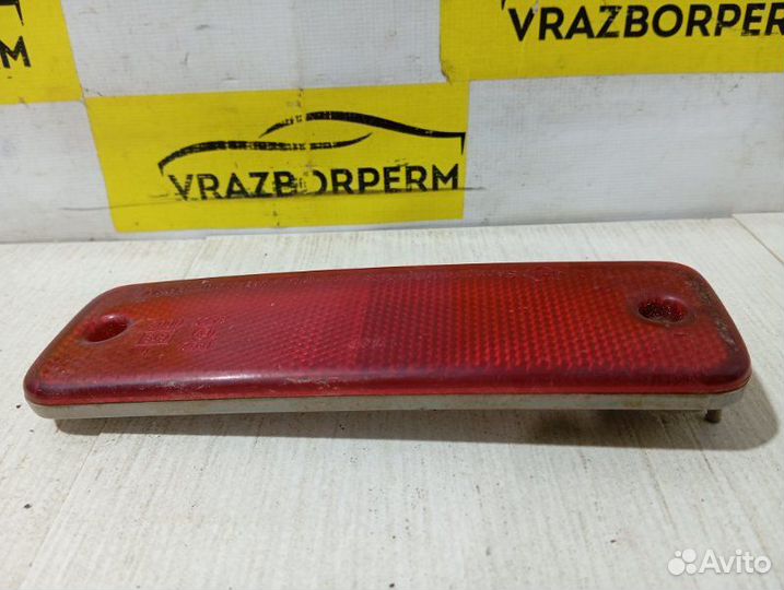 Отражатель в бампер задний левый Ssang Yong Musso