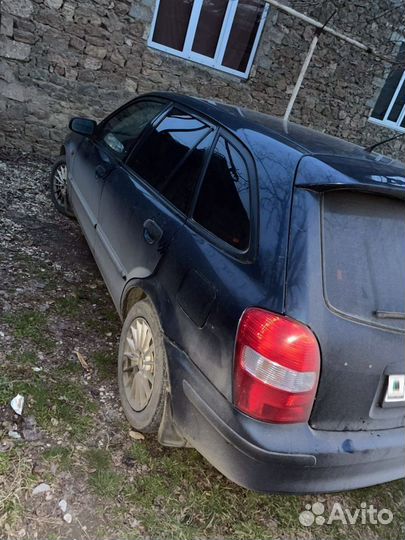 Mazda 323 1.5 МТ, 1999, 290 000 км