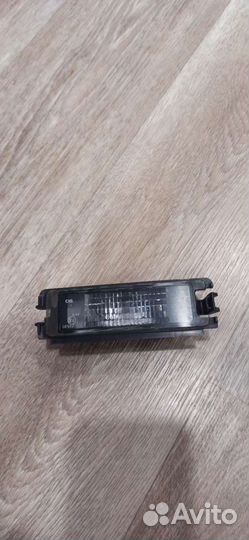 Плафон подсветки номера Renault Logan 2012