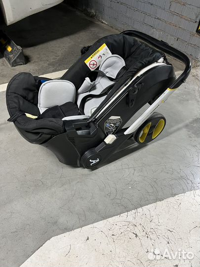 Детское автокресло коляска doona