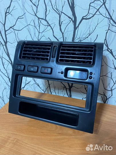 Передняя рамка печки Carina e