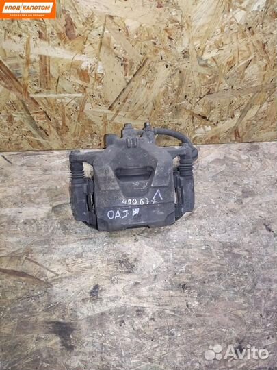 Суппорт тормозной передний левый Opel Astra J