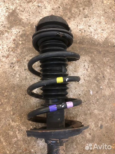 Стойка амортизатора передняя левая Hyundai Solaris