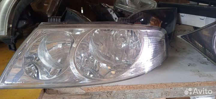 Фара L Nissan Almera Classic 06